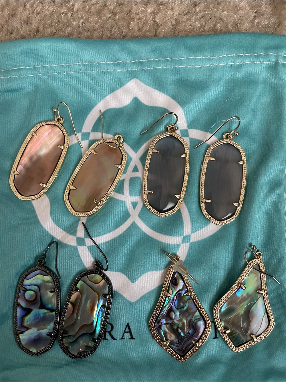 4 pair Kendra Scott Earrings